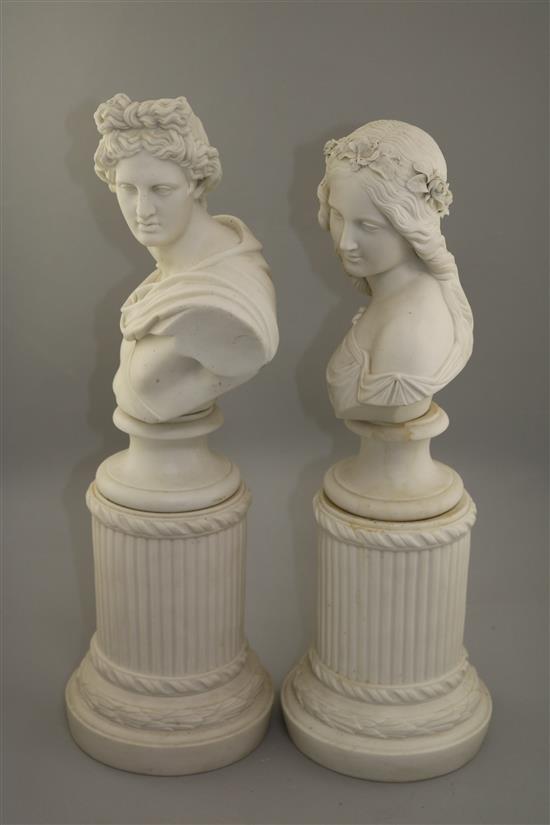A pair of parian busts and columns, 19th century, 50cm and 48.5cm, slight losses to flowers